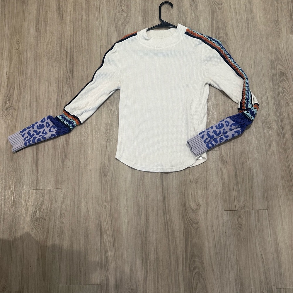 Stylish White Top with Colorful Sleeves